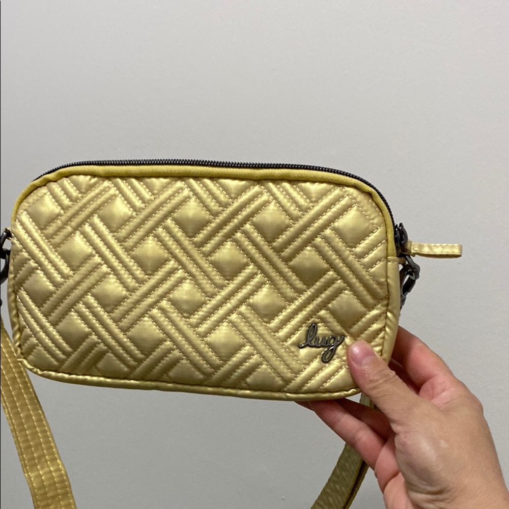 NWOT Coupe XL Lug Gold Quilted Coupe XL Crossbody Bag convertible.